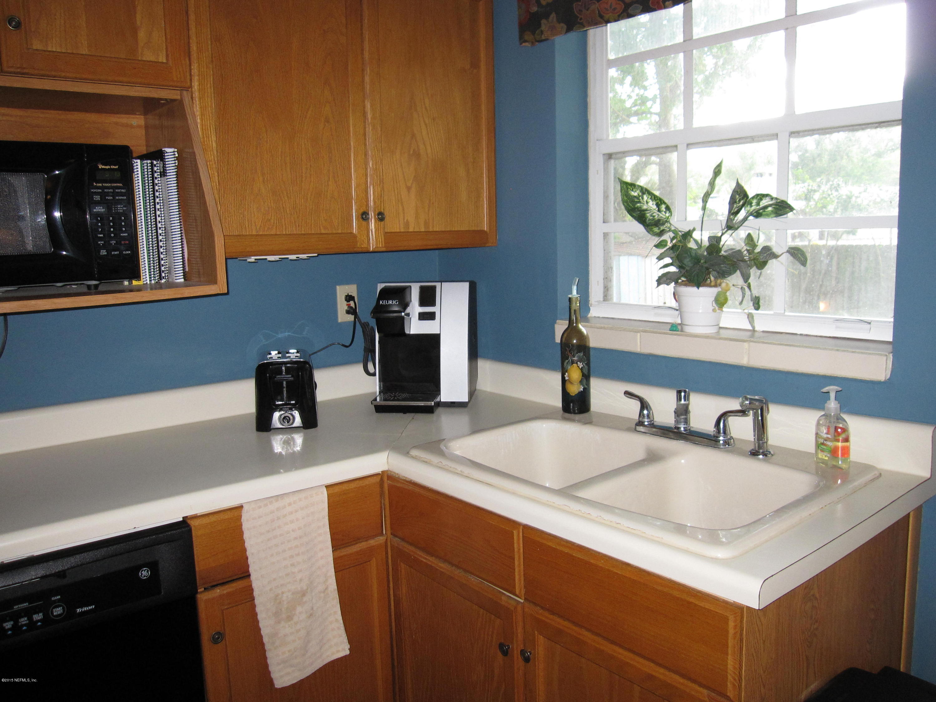 6416 Wesleyan Road Jacksonville, FL 32217 - Photo 23 of 35 a kitchen with sink and window