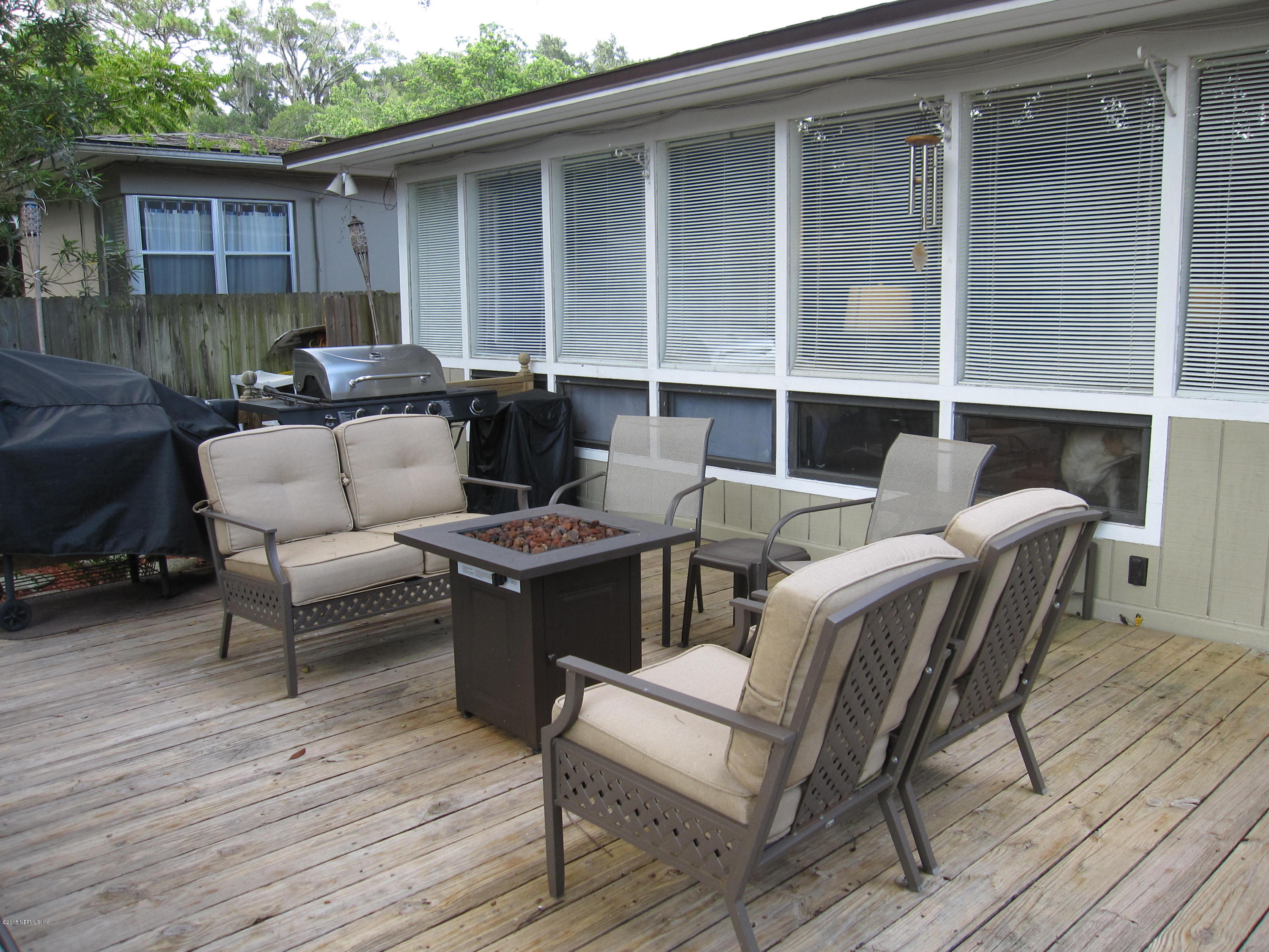 6416 Wesleyan Road Jacksonville, FL 32217 - Photo 27 of 35 a building outdoor space with patio furniture