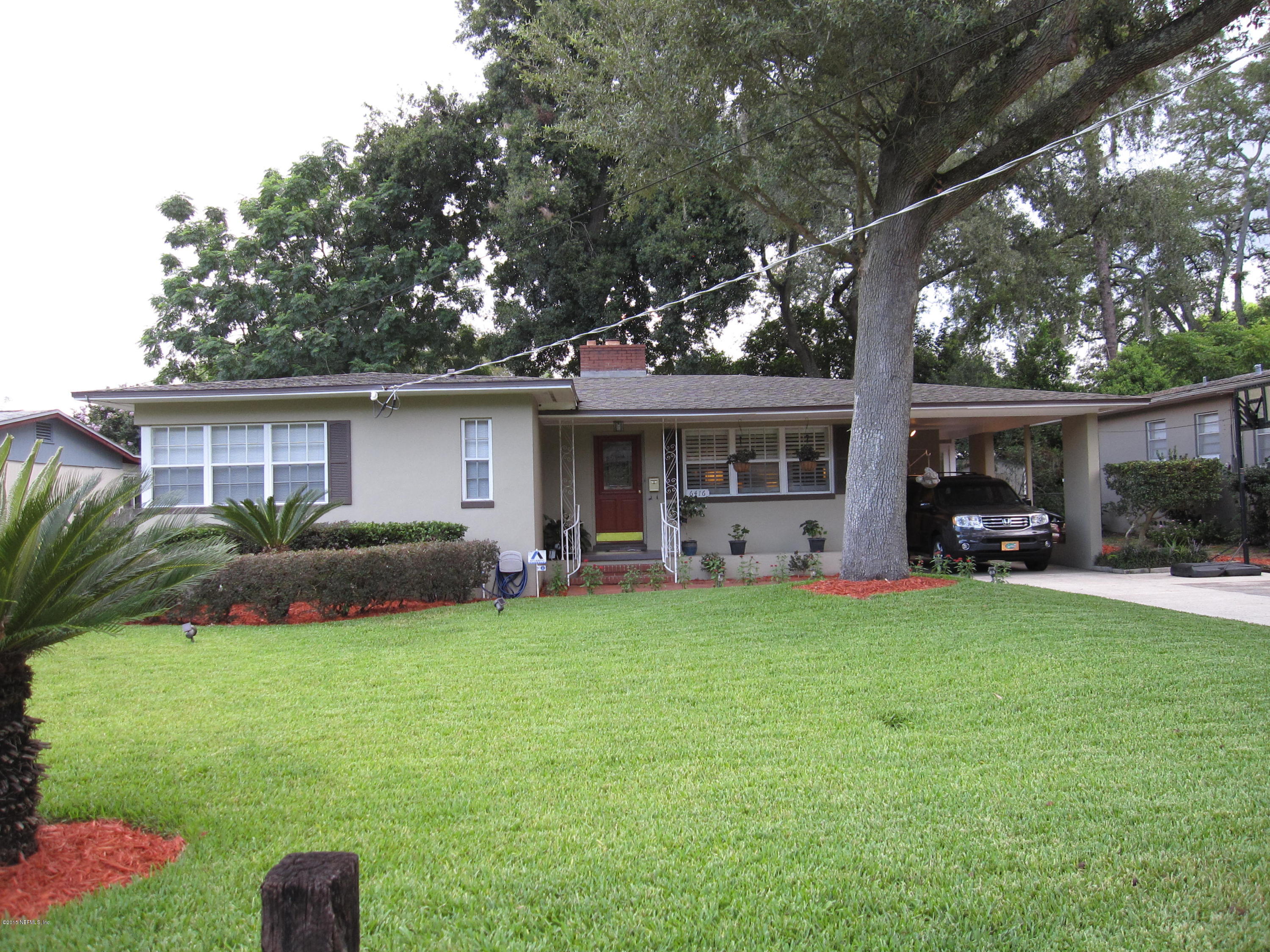 6416 Wesleyan Road Jacksonville, FL 32217 - Photo 3 of 35 a view of a house with a yard porch and sitting area