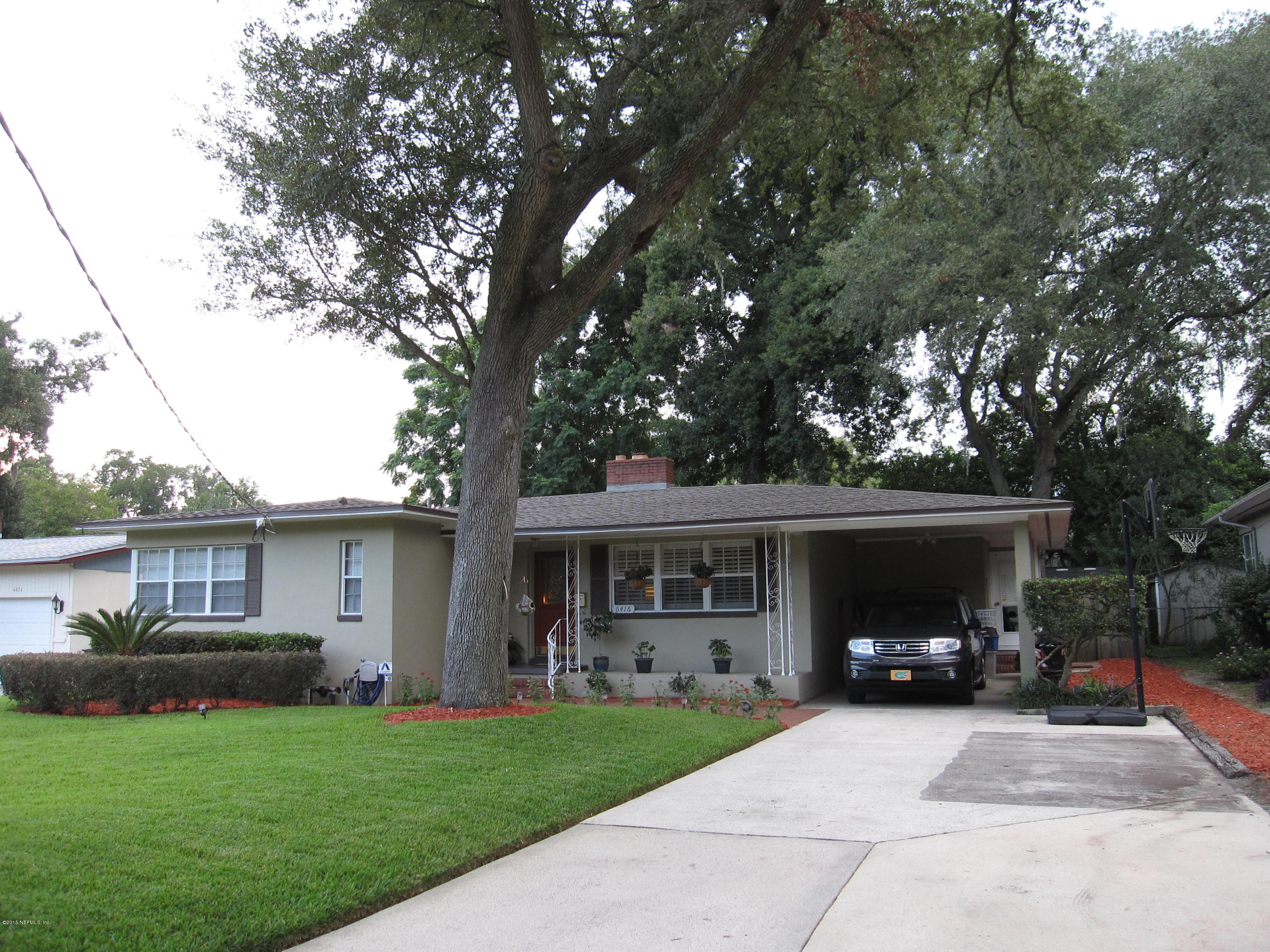 6416 Wesleyan Road Jacksonville, FL 32217 - Photo 34 of 35 a view of house with yard and entertaining space