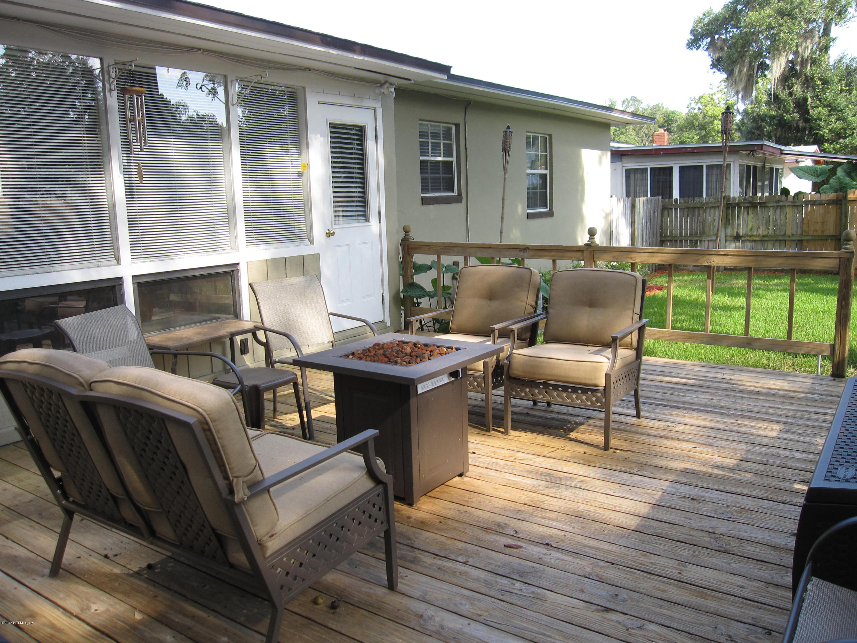 6416 Wesleyan Road Jacksonville, FL 32217 - Photo 4 of 35 a outdoor living space with furniture