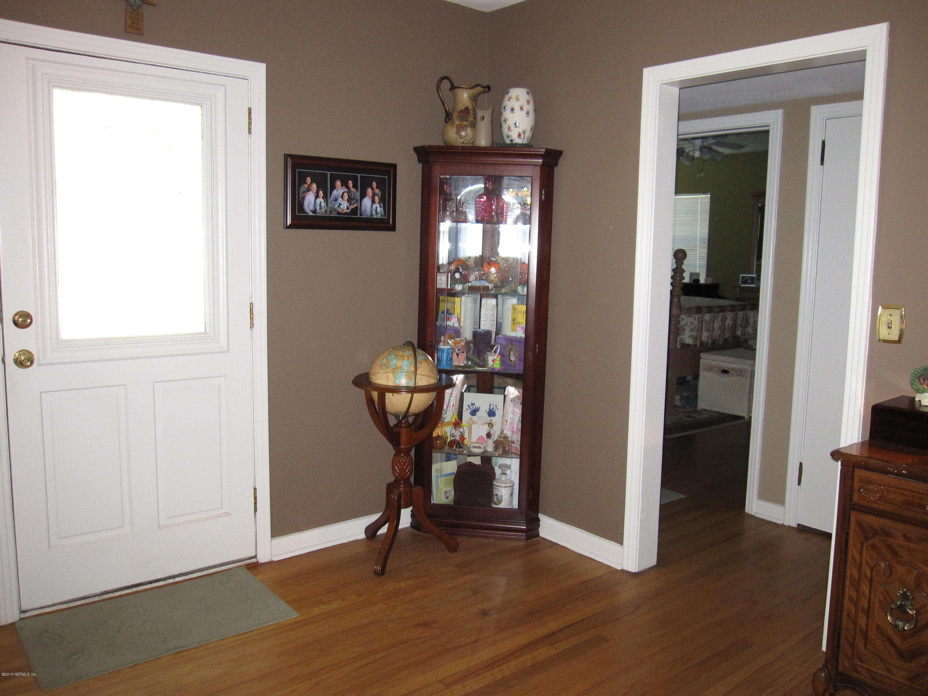 6416 Wesleyan Road Jacksonville, FL 32217 - Photo 9 of 35 a view of a livingroom with furniture and a window