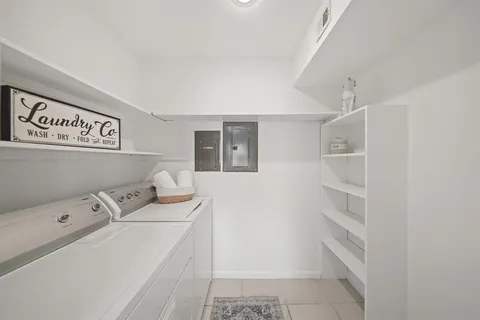 a bathroom with a sink toilet and mirror
