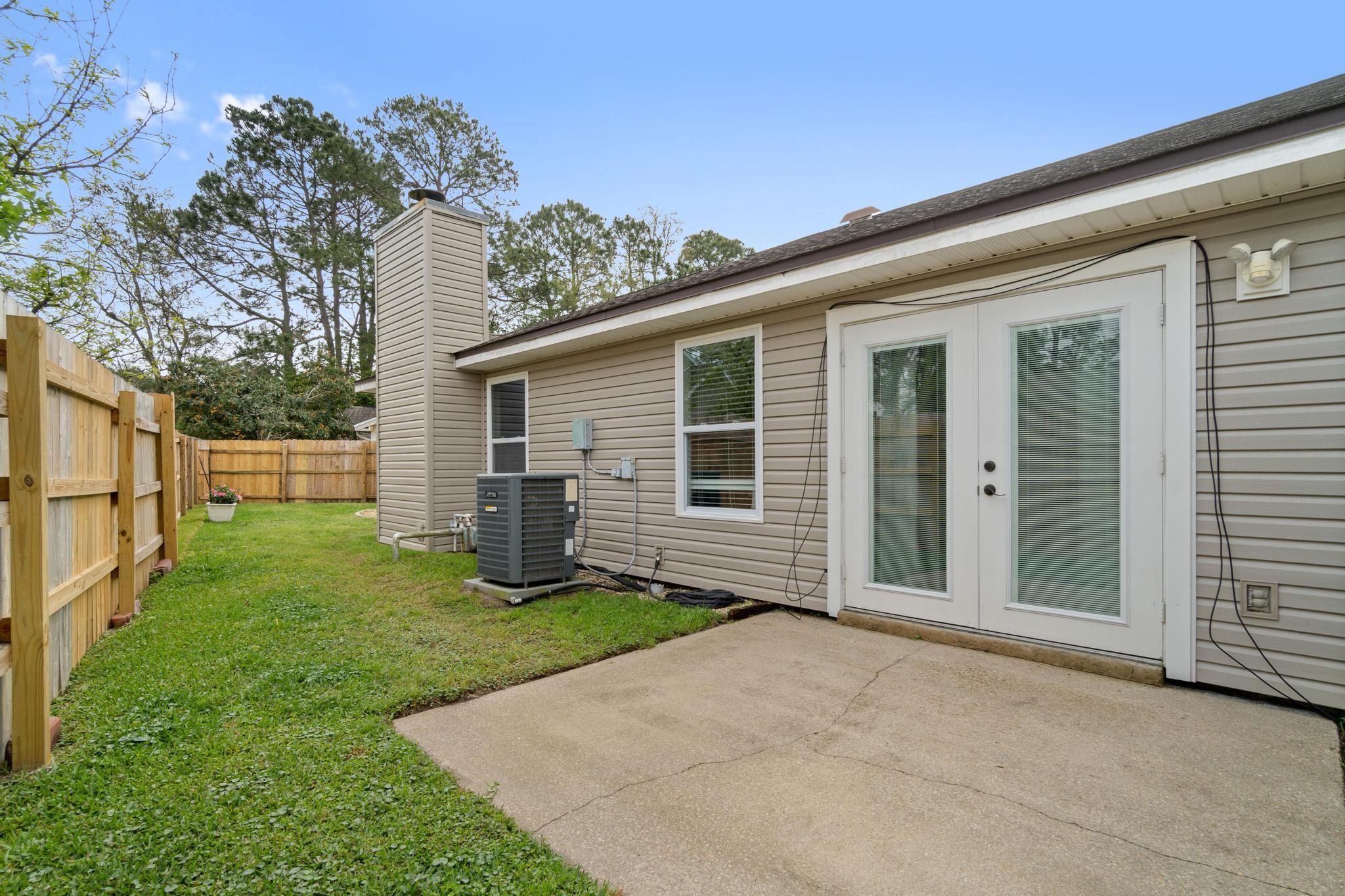1833 Hunters Path Fort Walton Beach, FL 32547 - Photo 31 of 34 a view of a house with yard