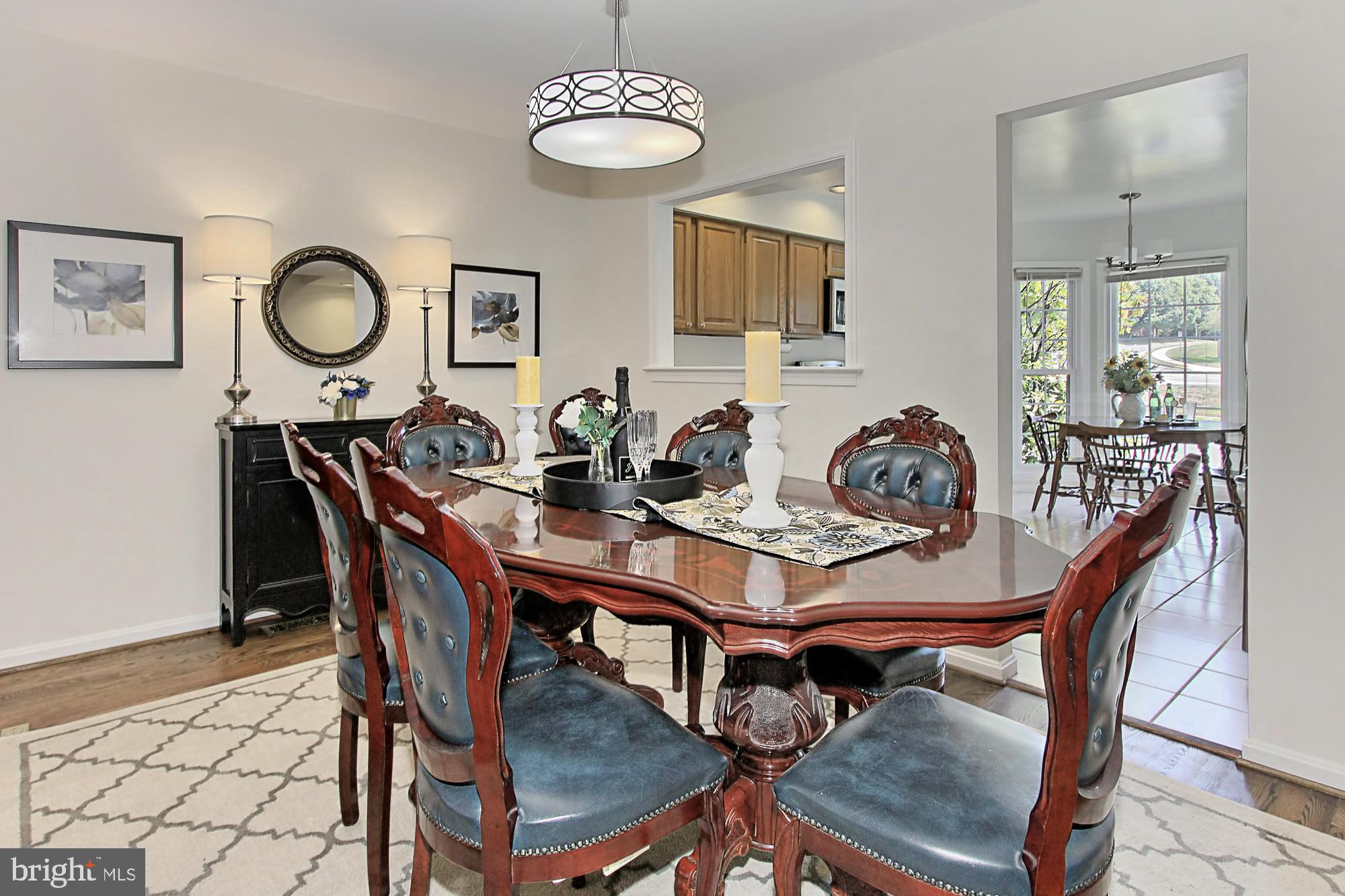 7469 Ridge Oak Court Springfield, VA 22153 - Photo 5 of 18 The separate dining room has new lighting.