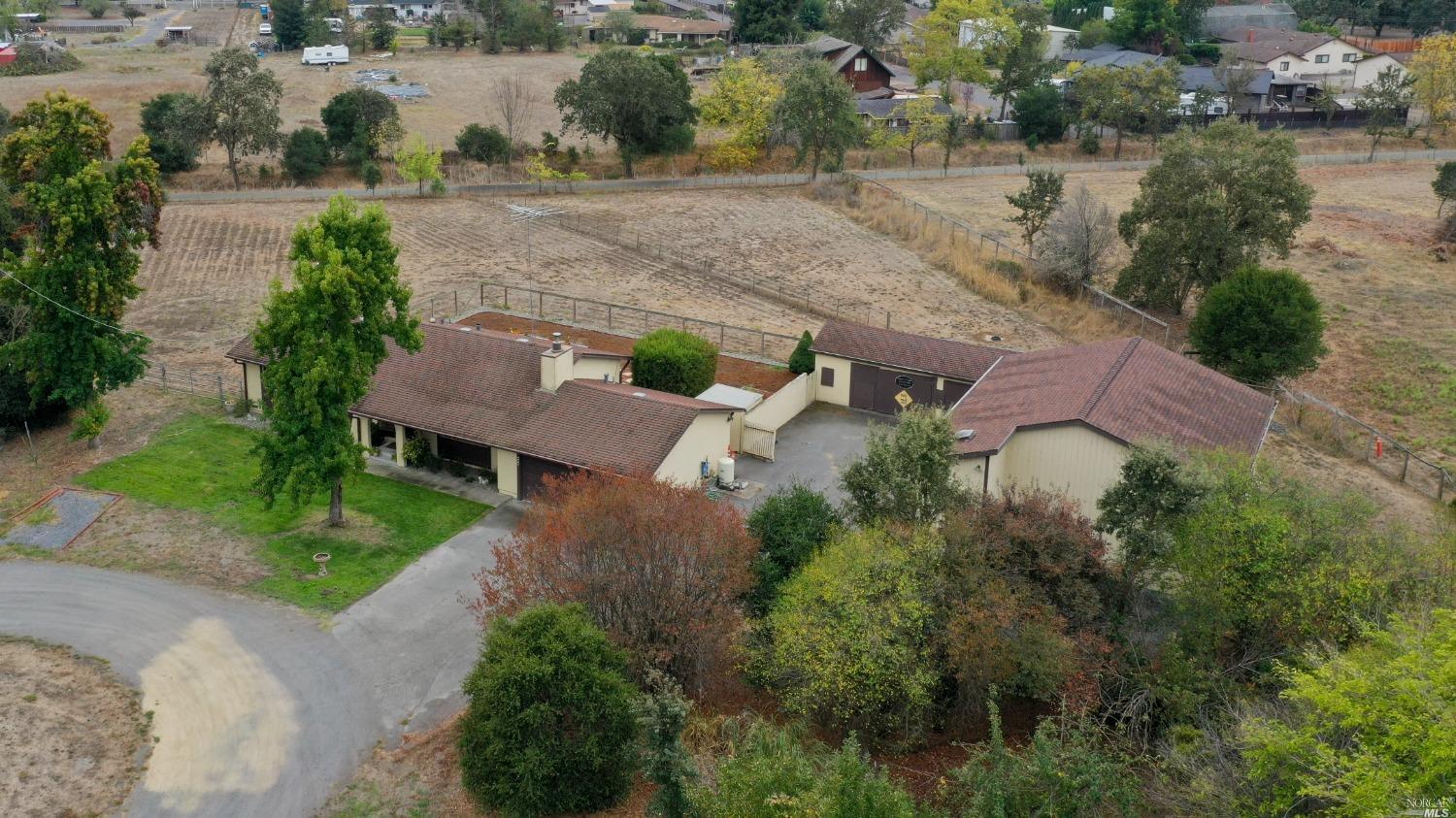 600 Hunter Lane Santa Rosa, CA 95404 - Photo 1 of 1 an aerial view of a house with outdoor space and street view