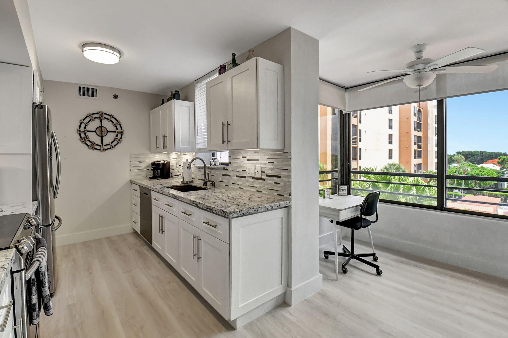 7217 Promenade Drive, Unit 502 Boca Raton, FL 33433 - Photo 10 of 46 Kitchen and office space