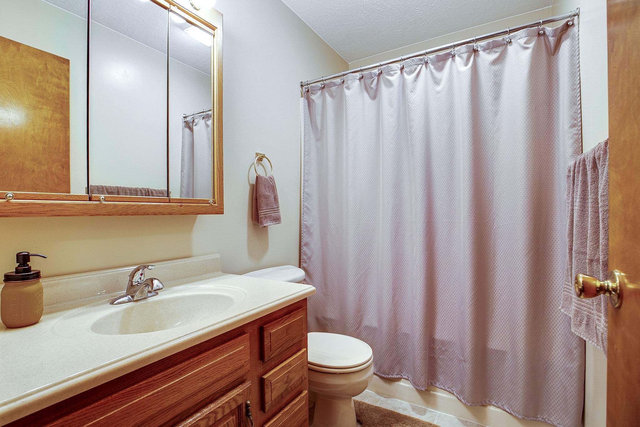 9513 Link Road Christiana, TN 37037 - Photo 17 of 34 a bathroom with a sink and a mirror