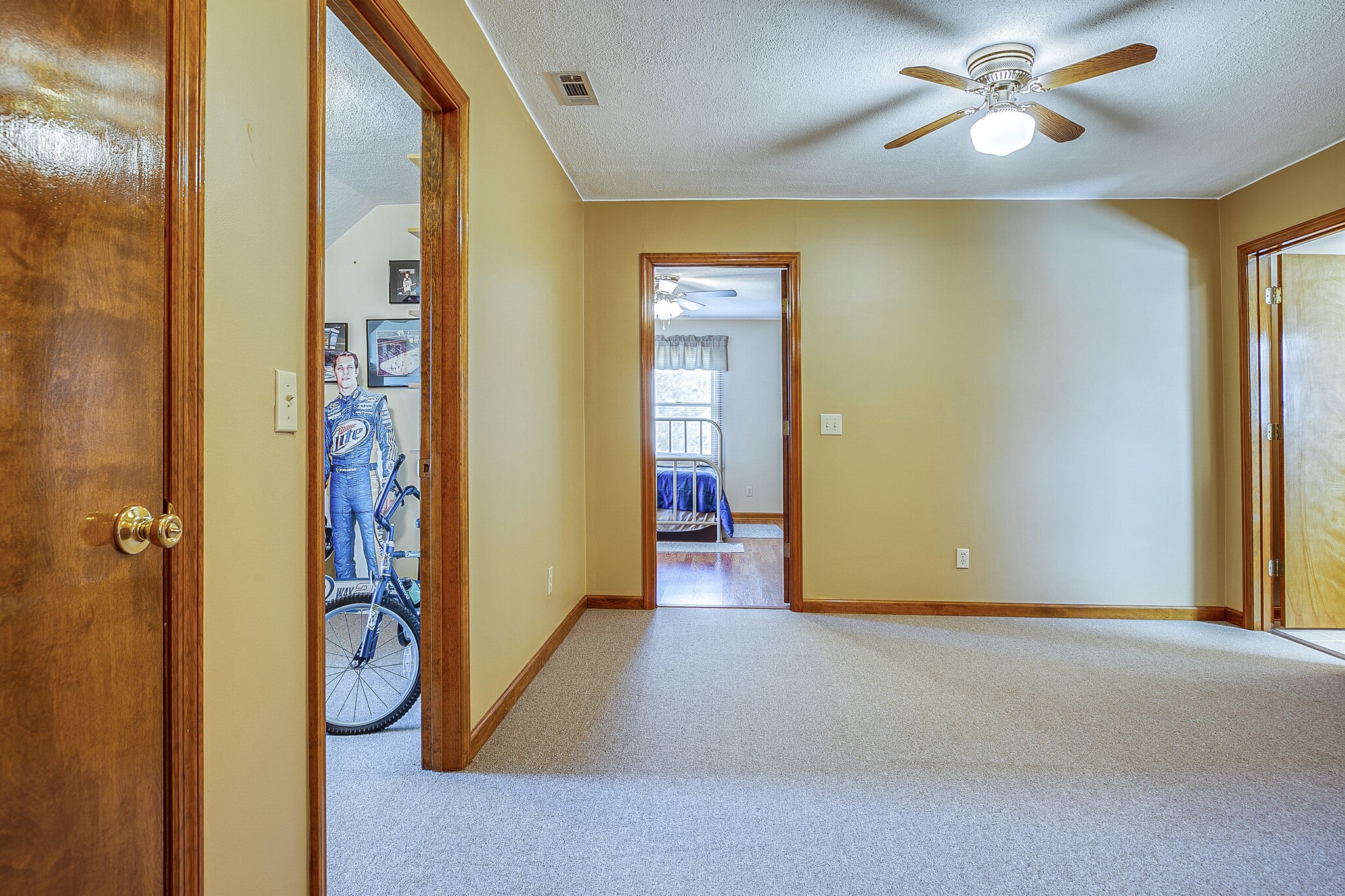 9513 Link Road Christiana, TN 37037 - Photo 26 of 34 a view of a hallway with a chandelier fan