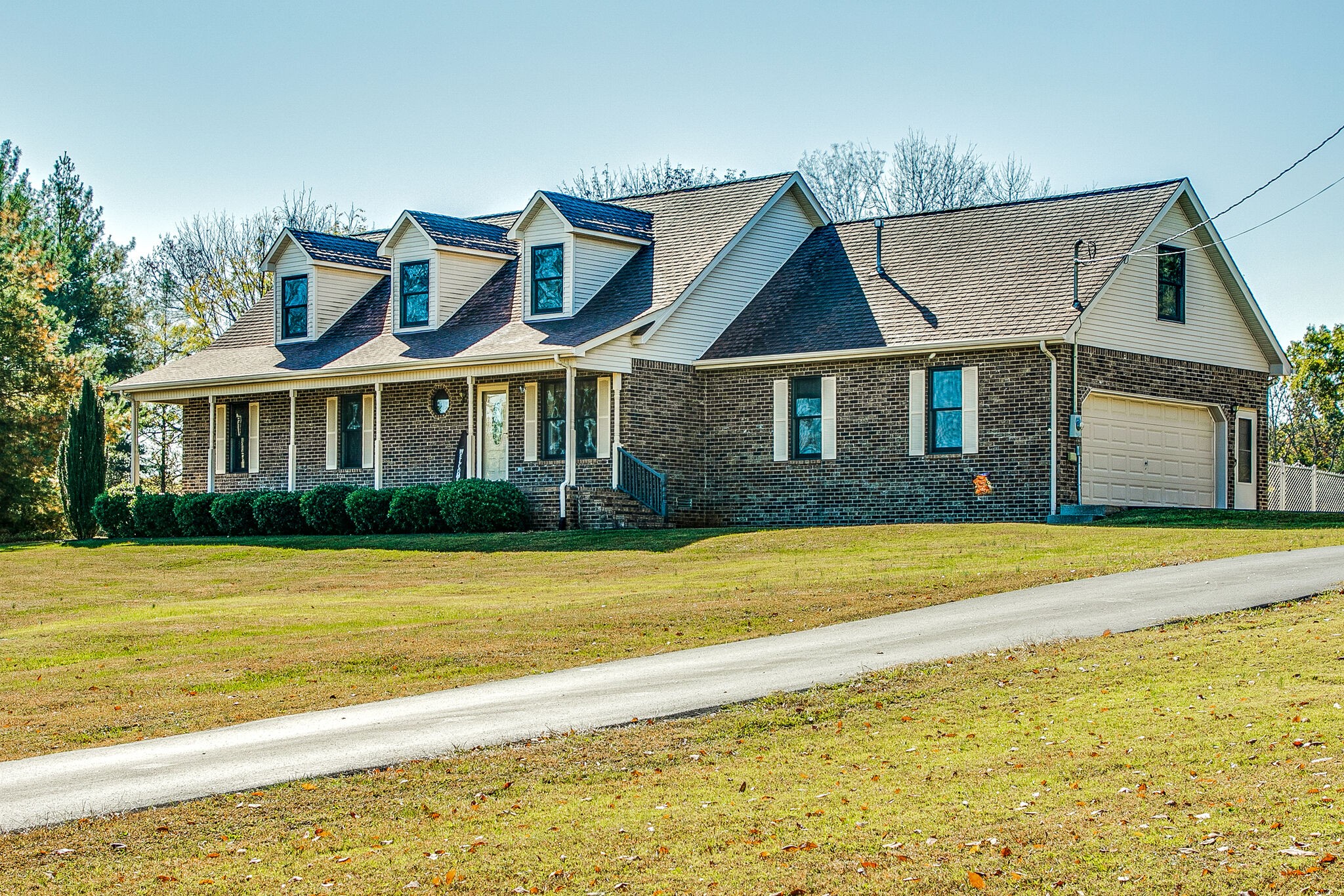 9513 Link Road Christiana, TN 37037 - Photo 3 of 34 a front view of a house with a swimming pool