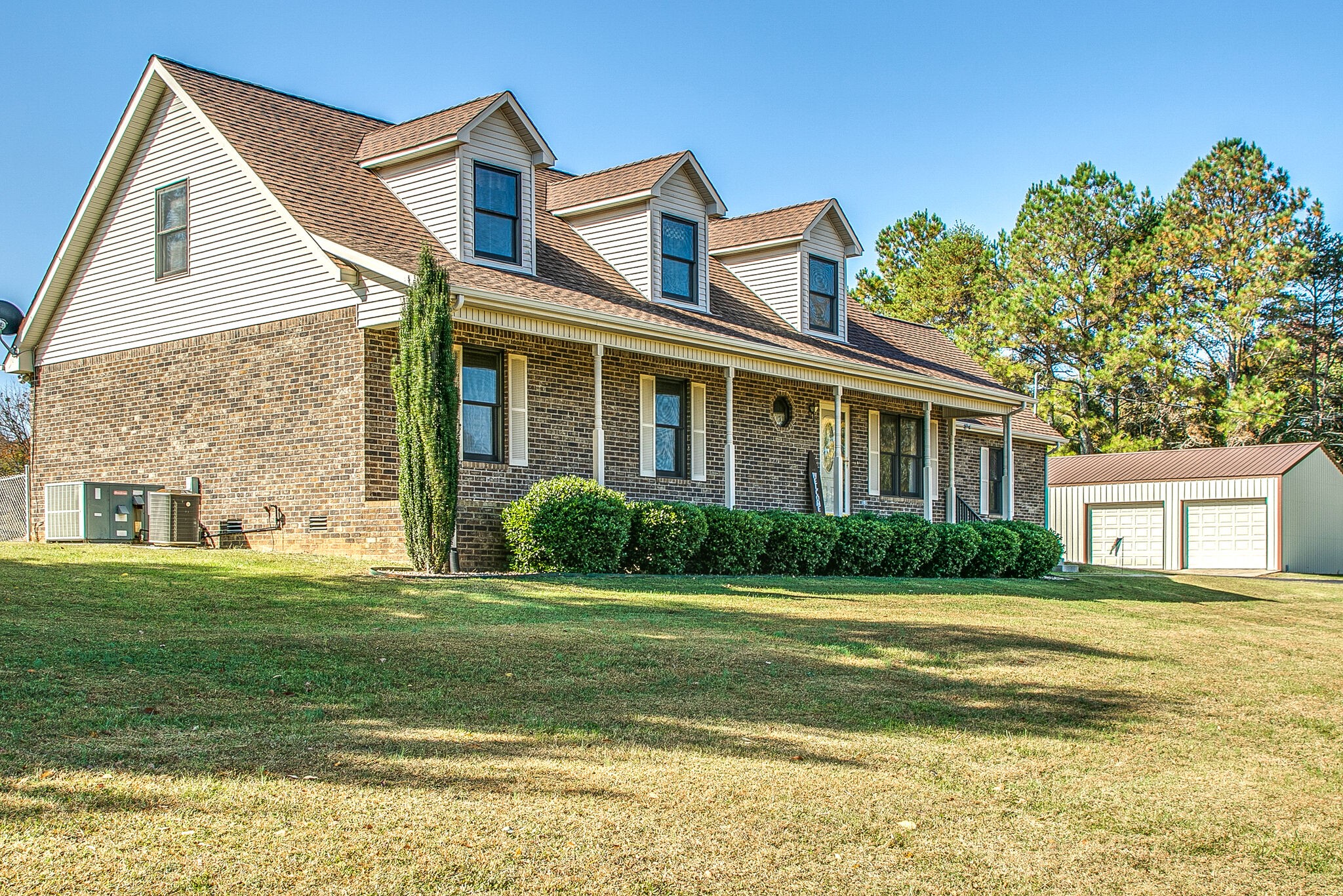 9513 Link Road Christiana, TN 37037 - Photo 4 of 34 a front view of a house with a yard