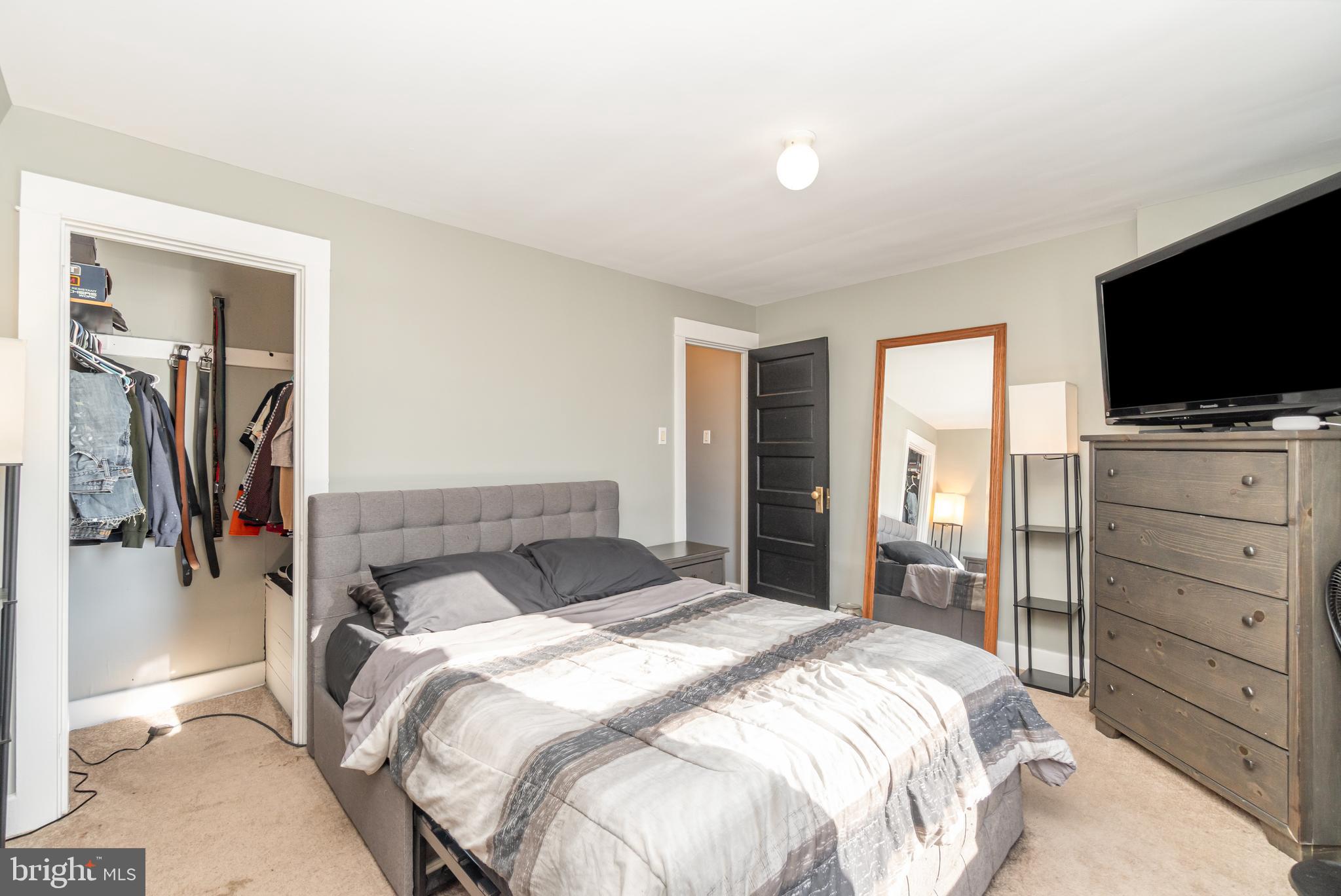 2246 Reading Avenue Reading, PA 19609 - Photo 15 of 27 a bedroom with a bed and a flat screen tv