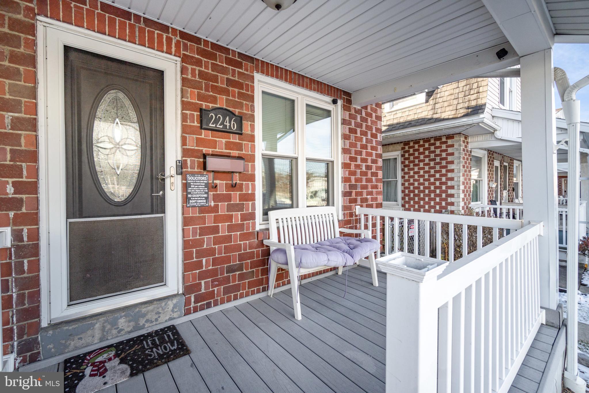 2246 Reading Avenue Reading, PA 19609 - Photo 5 of 27 a view of a porch with wooden floor and outdoor seating