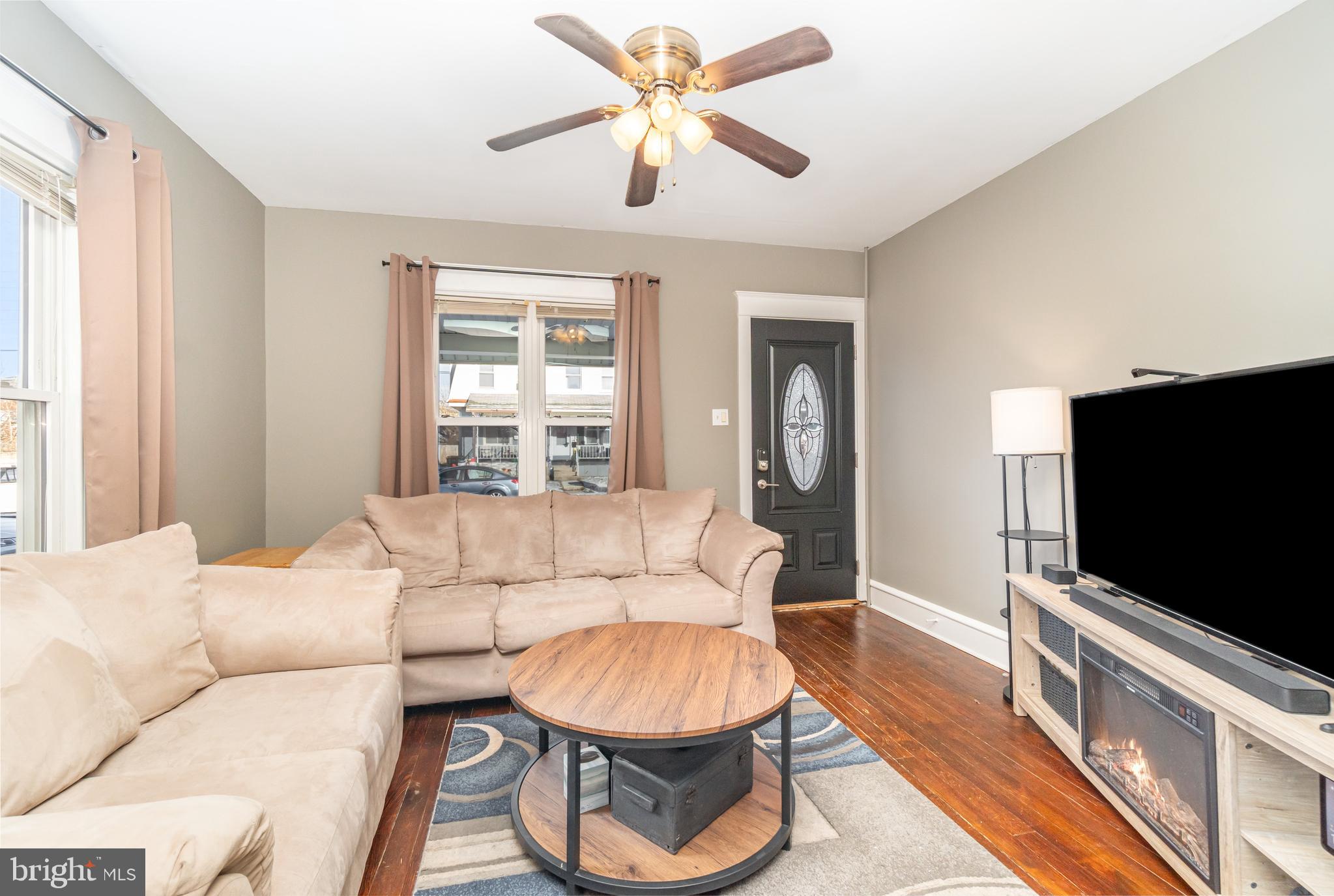 2246 Reading Avenue Reading, PA 19609 - Photo 6 of 27 a living room with furniture and a flat screen tv
