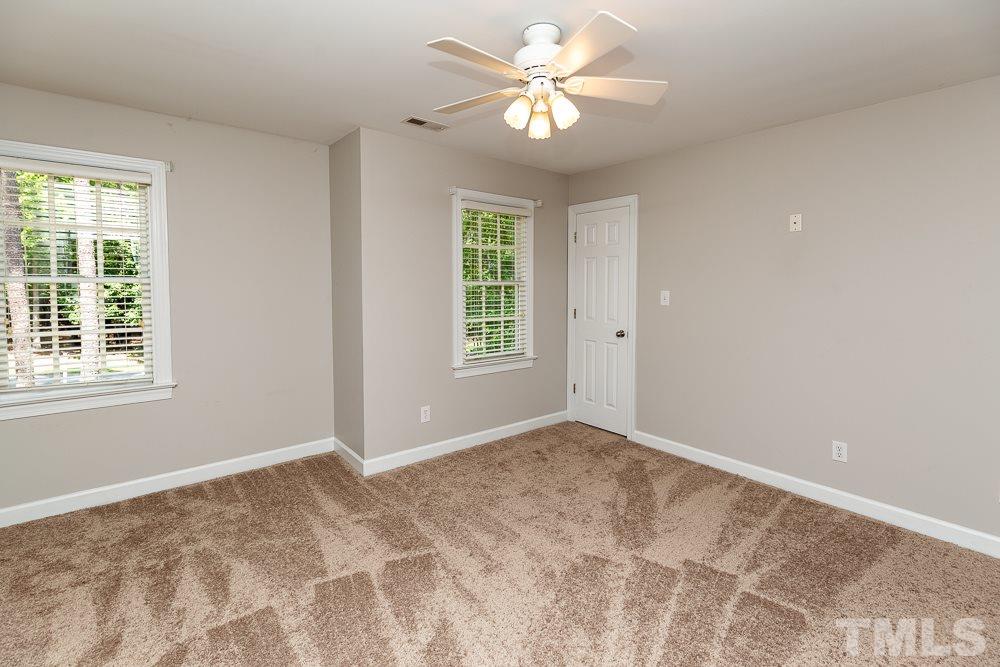 2724 Dray Court Raleigh, NC 27613 - Photo 14 of 25 a view of an empty room with a window