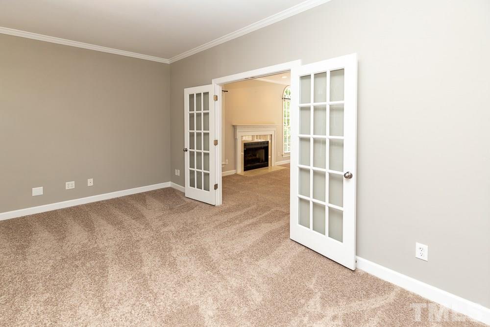 2724 Dray Court Raleigh, NC 27613 - Photo 3 of 25 an empty room with windows