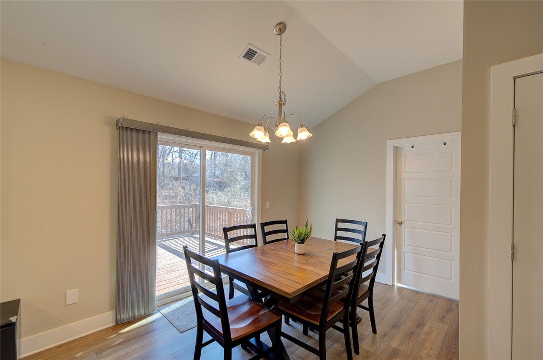 110 Sanders Drive Easley, SC 29642 - Photo 9 of 23 This dining area features an inviting ambiance with direct outdoor access.