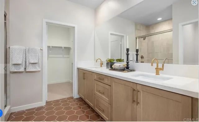 a kitchen with stainless steel appliances granite countertop a stove microwave and cabinets