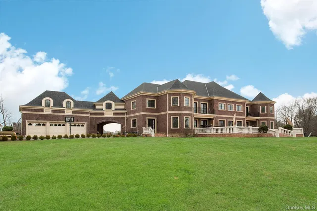 a view of a house with swimming pool yard and patio