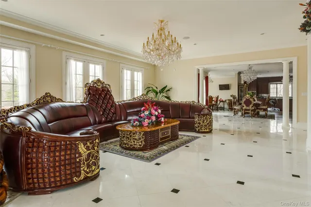 a view of a dining room with furniture and window