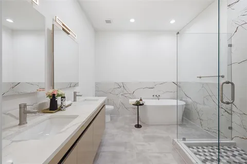a bathroom with a sink and mirror