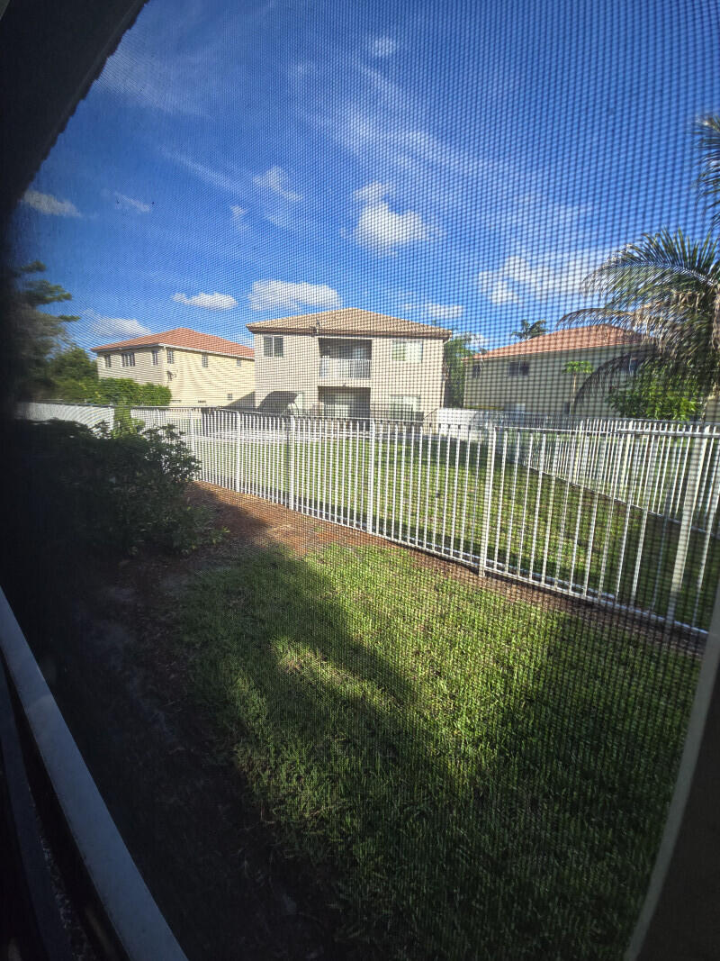 6511 Sandy Bank Terrace Riviera Beach, FL 33407 - Photo 5 of 12 a view of a balcony