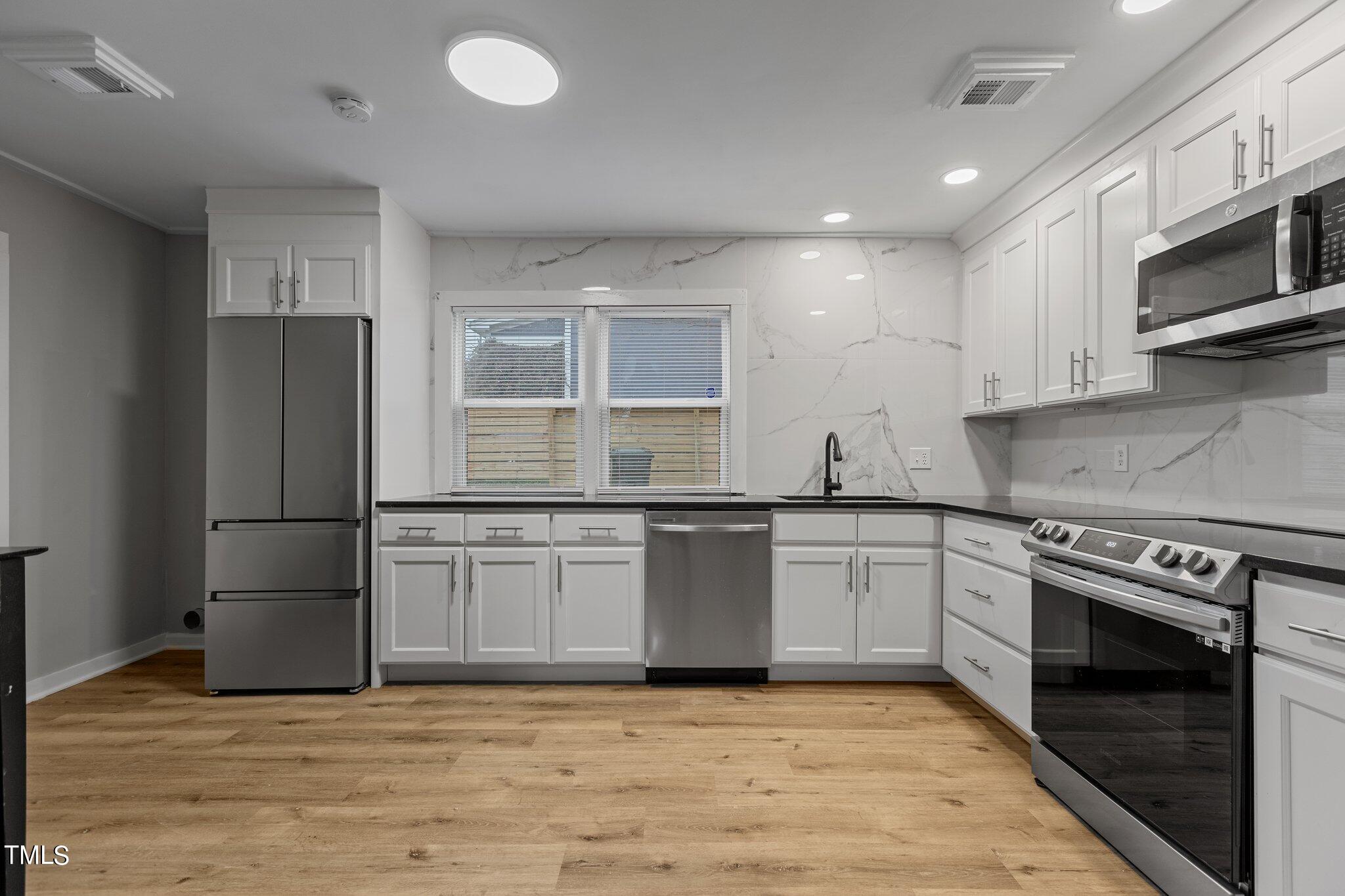 1601 Pender Street Raleigh, NC 27610 - Photo 6 of 46 Unit A fully renovated eat in kitchen