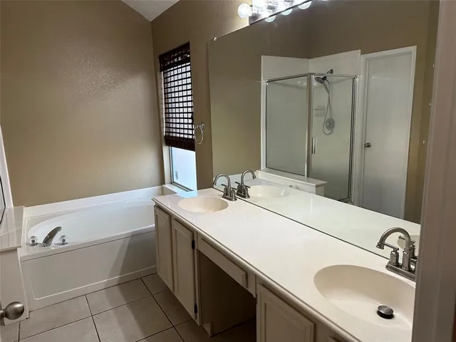 a bathroom with a sink and a bathtub