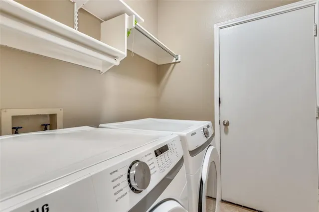 a view of backyard with a deck and wooden floor