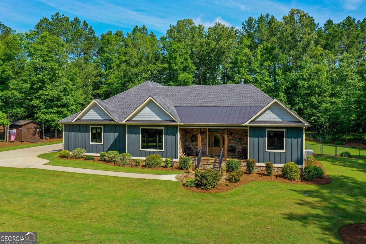 151 Sinclair Circle Southeast Eatonton, GA 31024 - Photo 1 of 66
