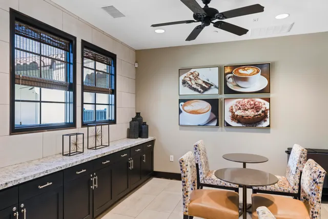 a view of backyard with furniture and outdoor seating