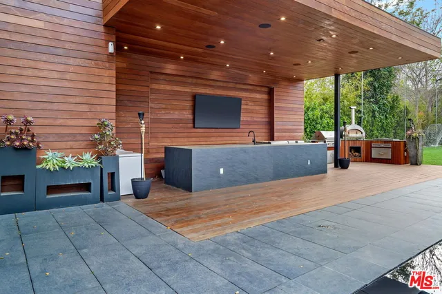 a view of a balcony and chairs