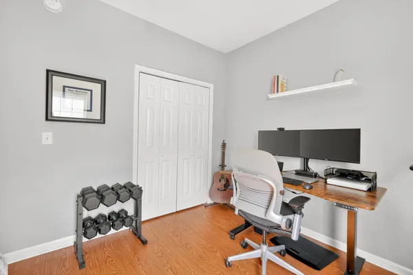 a living room with furniture and a rug