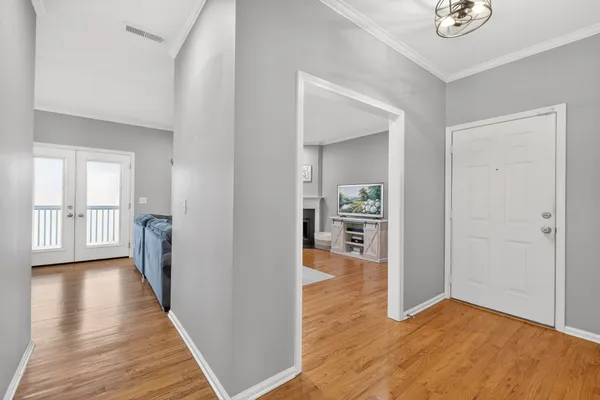 a house view with swimming pool and garden