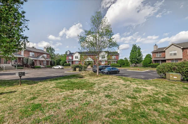 a view of front of house with a yard