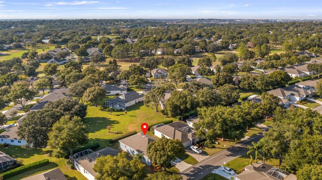 4232 Newland Street Clermont, FL 34711 - Photo 2 of 45 an aerial view of residential houses with outdoor space and trees