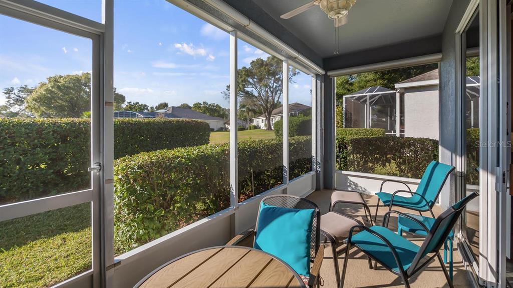 4232 Newland Street Clermont, FL 34711 - Photo 30 of 45 a view of a chair and table in the balcony