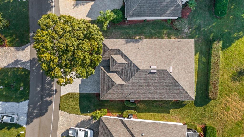 4232 Newland Street Clermont, FL 34711 - Photo 35 of 45 an aerial view of a house with a yard