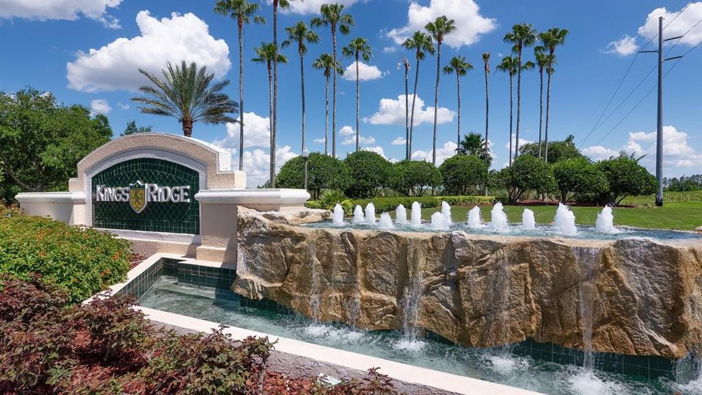 4232 Newland Street Clermont, FL 34711 - Photo 39 of 45 a view of a garden with a bench