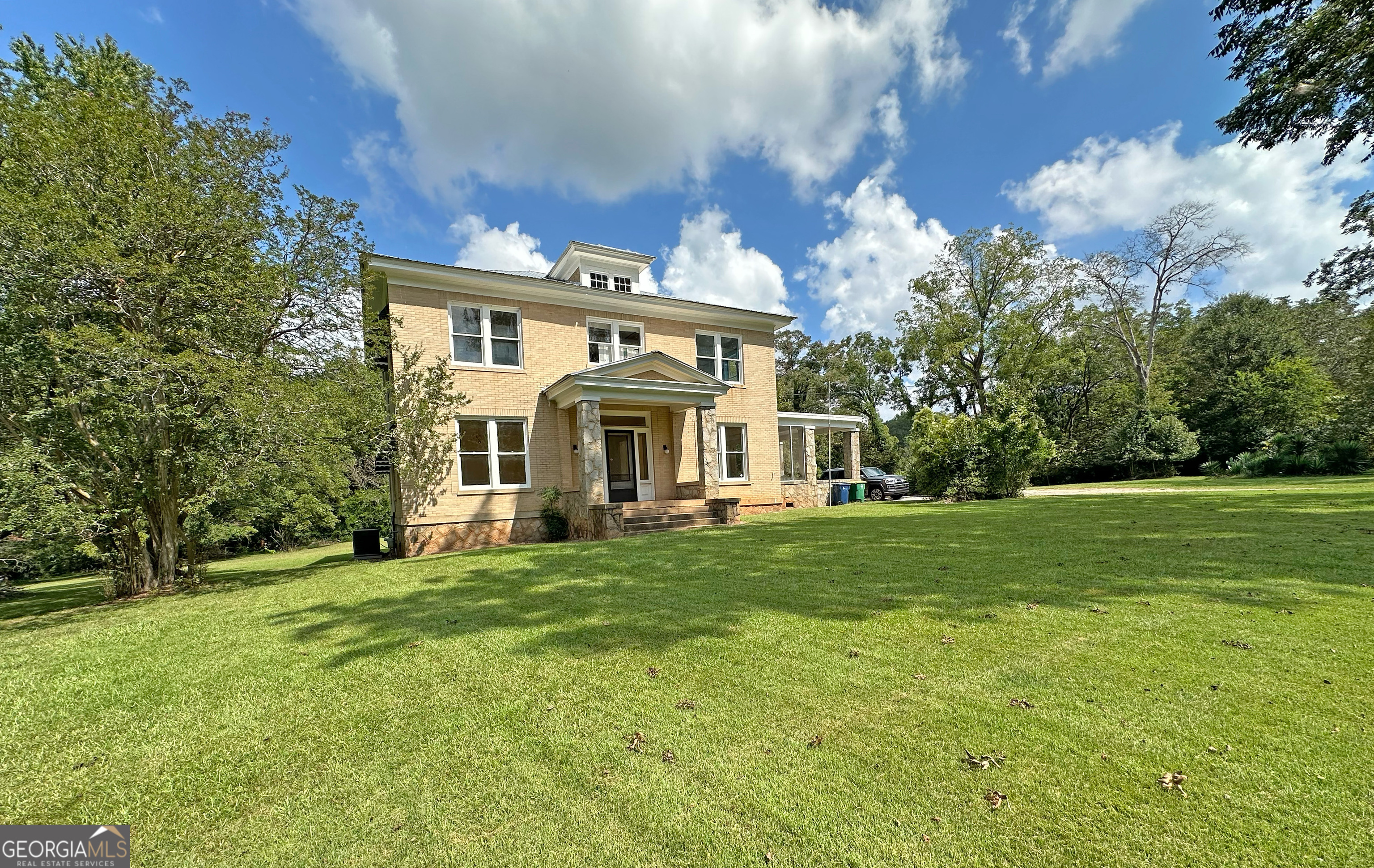 1010 Oglethorpe Avenue Athens, GA 30606 - Photo 3 of 28 a view of a house with a yard