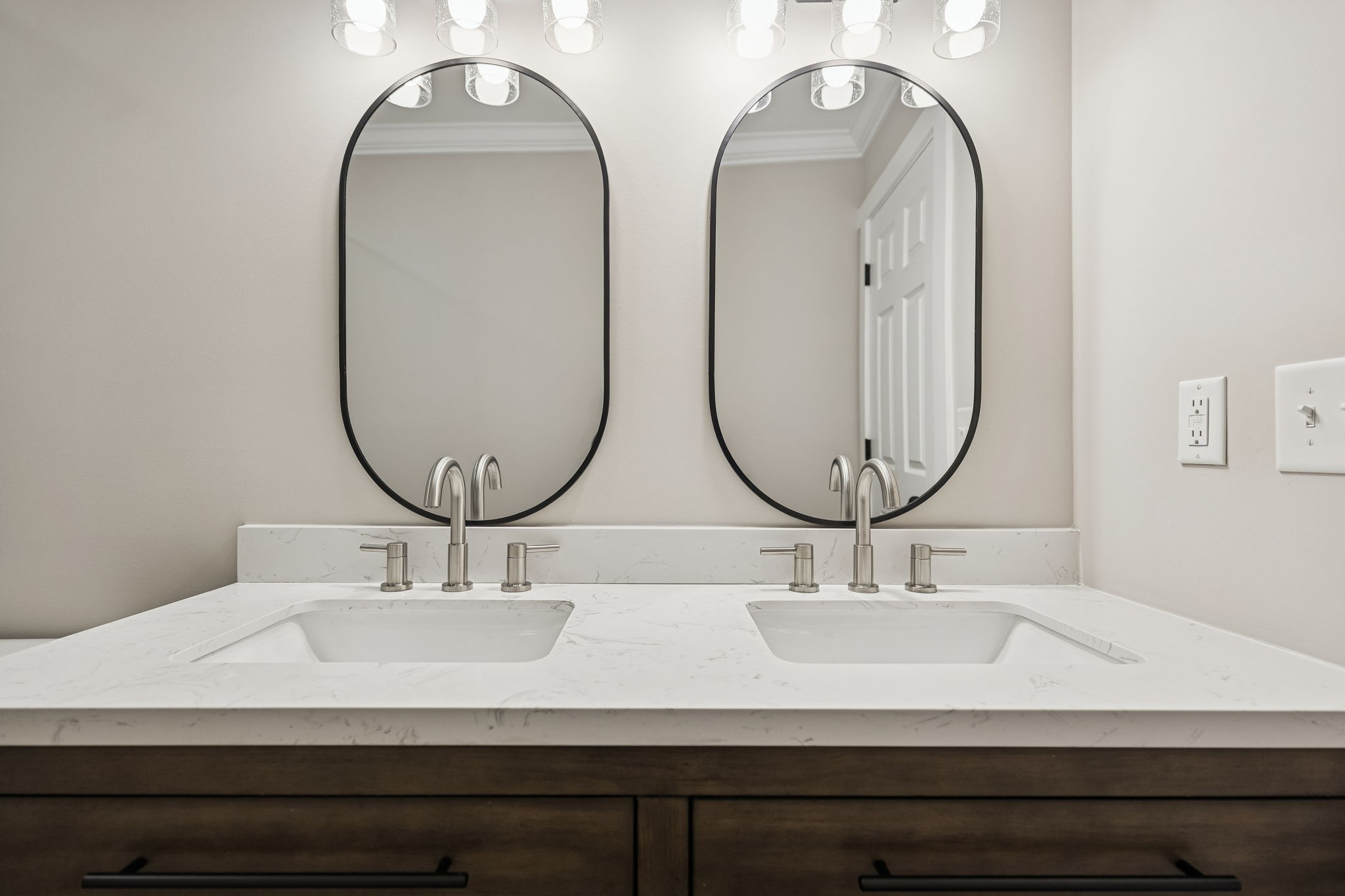 3770 Penile Hill Road Decherd, TN 37324 - Photo 12 of 32 a bathroom with double vanity sinks and a mirror
