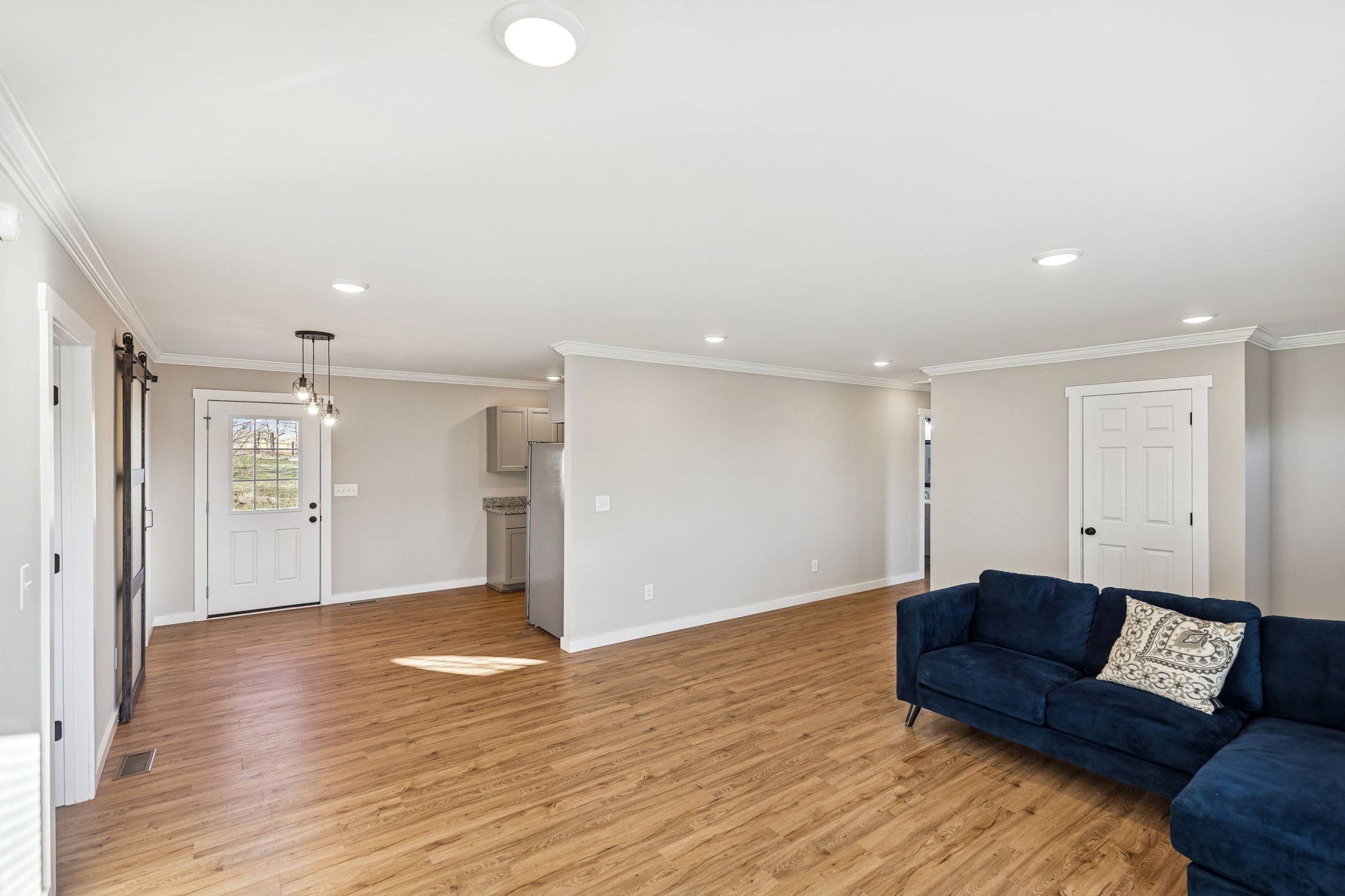 3770 Penile Hill Road Decherd, TN 37324 - Photo 5 of 32 a living room with furniture and a wooden floor