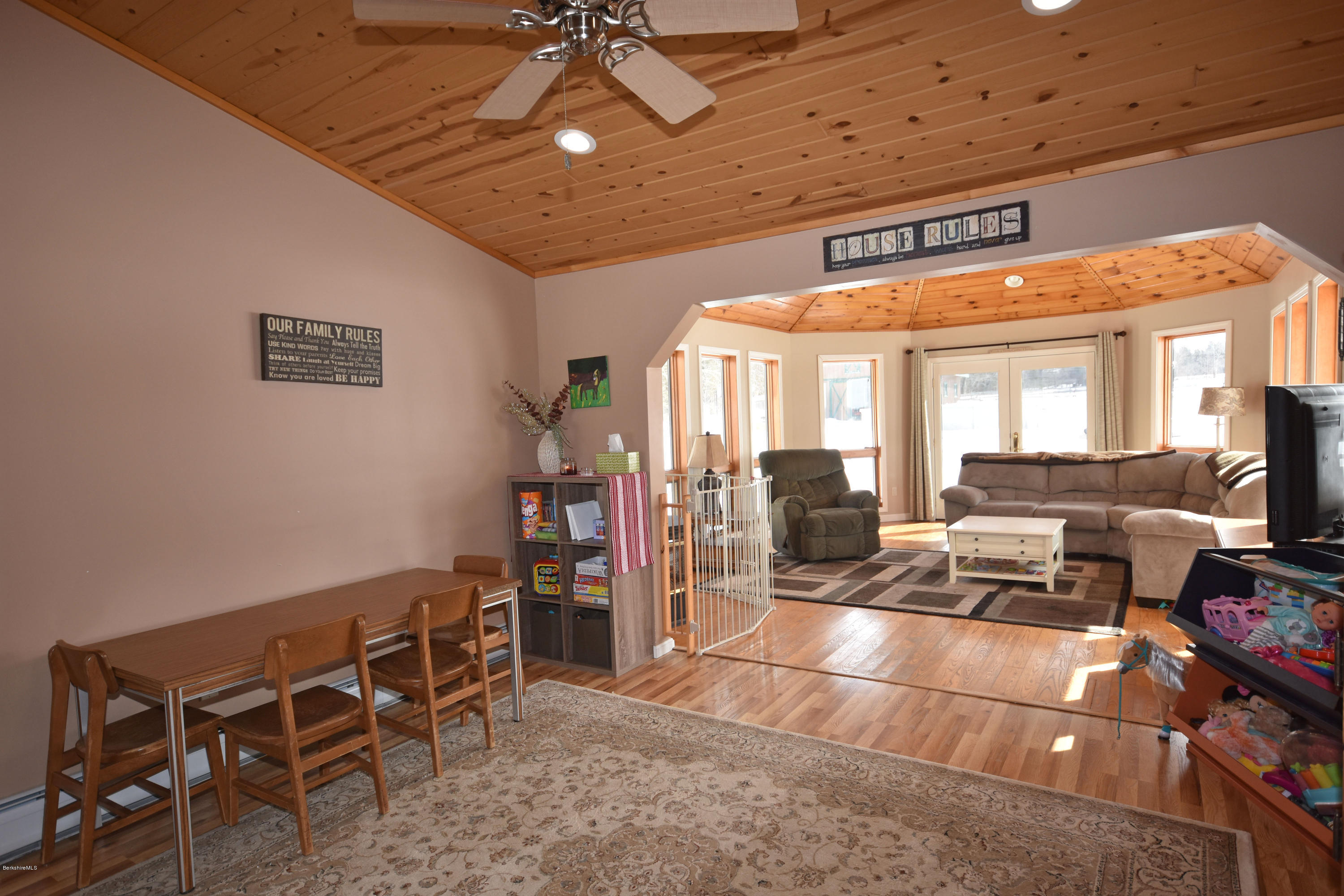 215 Windsor Road Savoy, MA 01256 - Photo 15 of 55 a view of a room with furniture and a chandelier