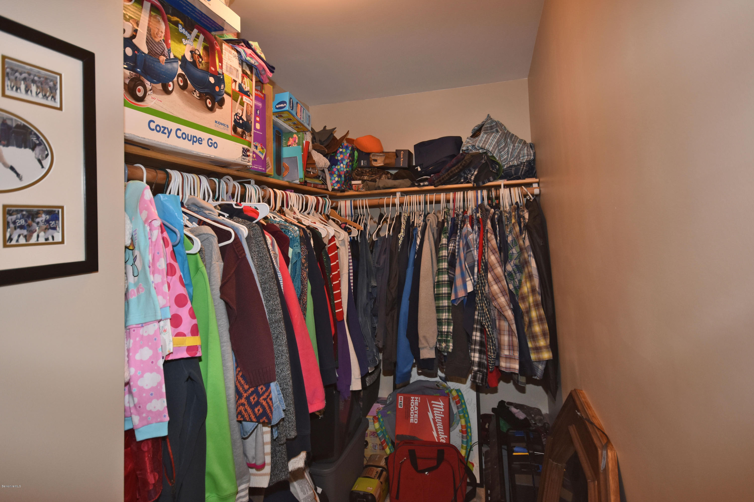 215 Windsor Road Savoy, MA 01256 - Photo 29 of 55 a view of walk in closet with clothes