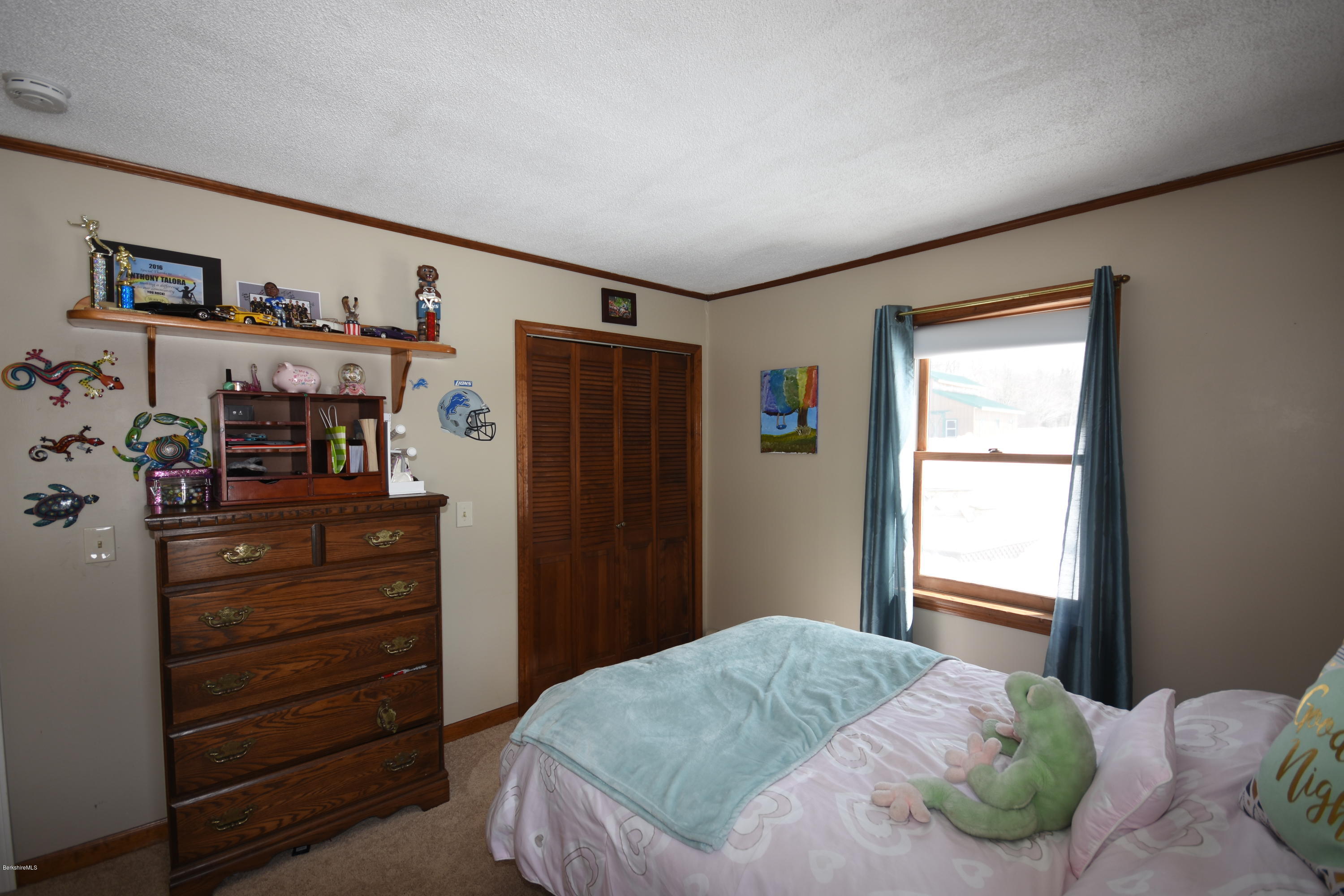 215 Windsor Road Savoy, MA 01256 - Photo 32 of 55 a bedroom with a bed and a window