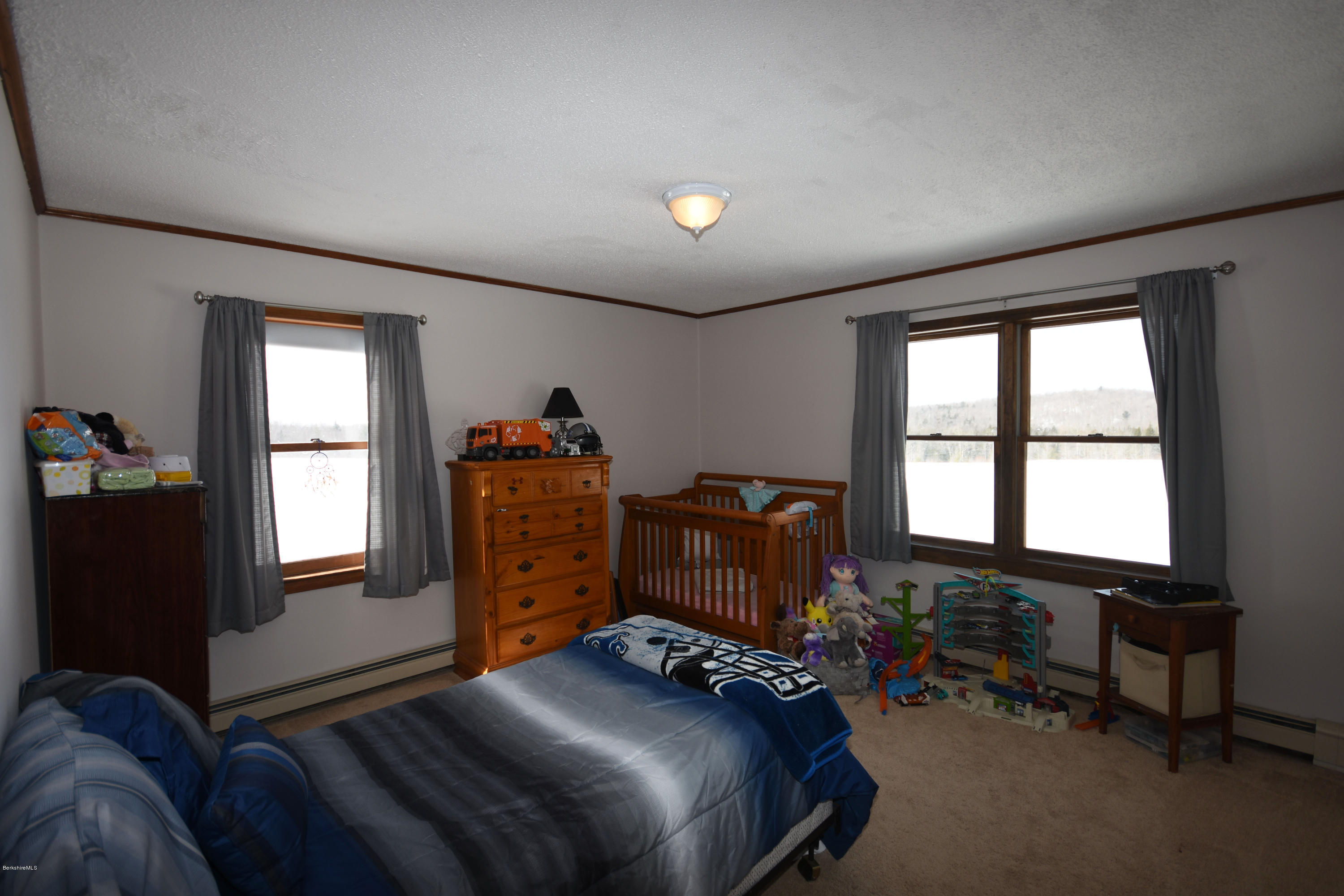 215 Windsor Road Savoy, MA 01256 - Photo 34 of 55 a bedroom with furniture and a window