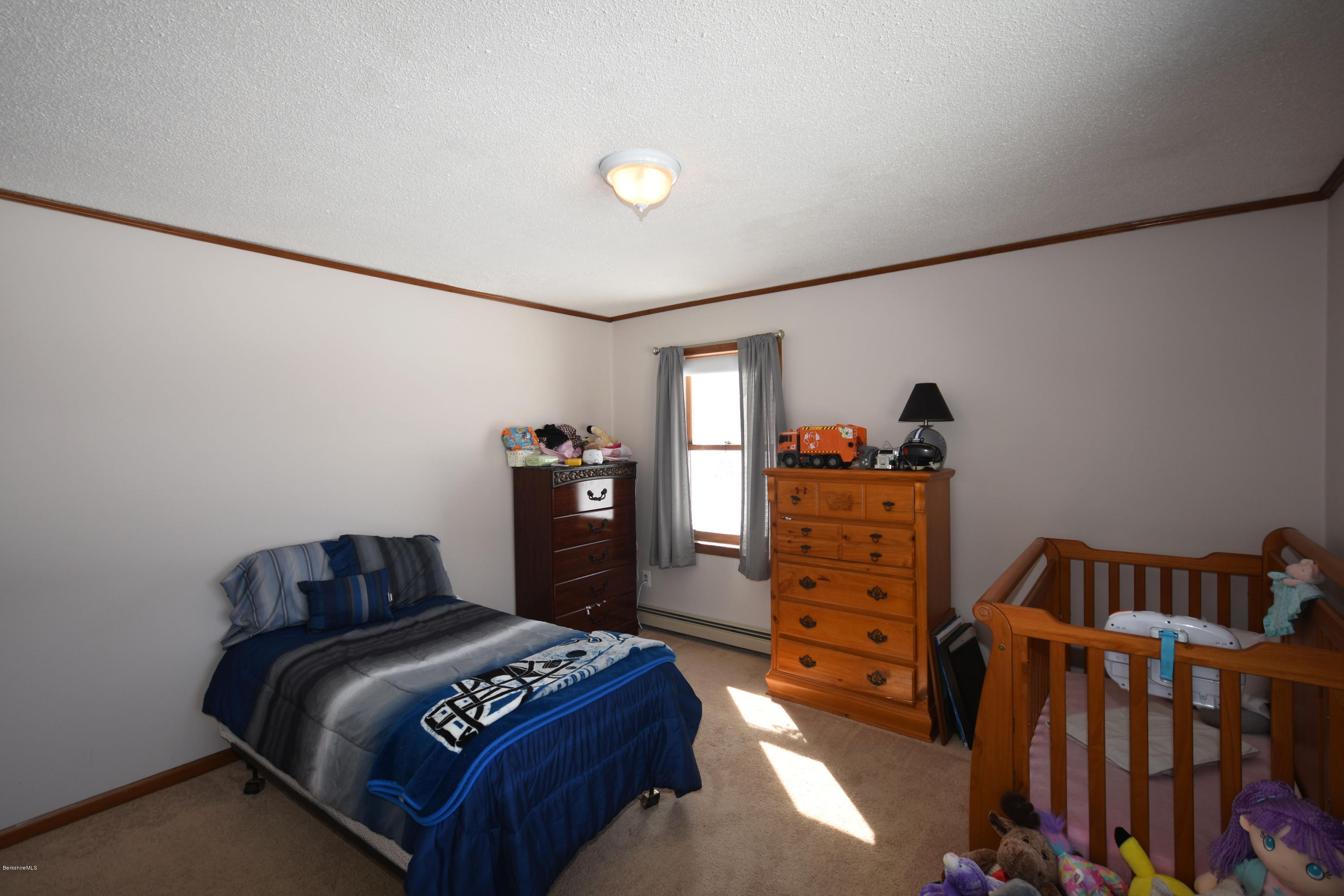 215 Windsor Road Savoy, MA 01256 - Photo 35 of 55 a bedroom with a bed and a closet