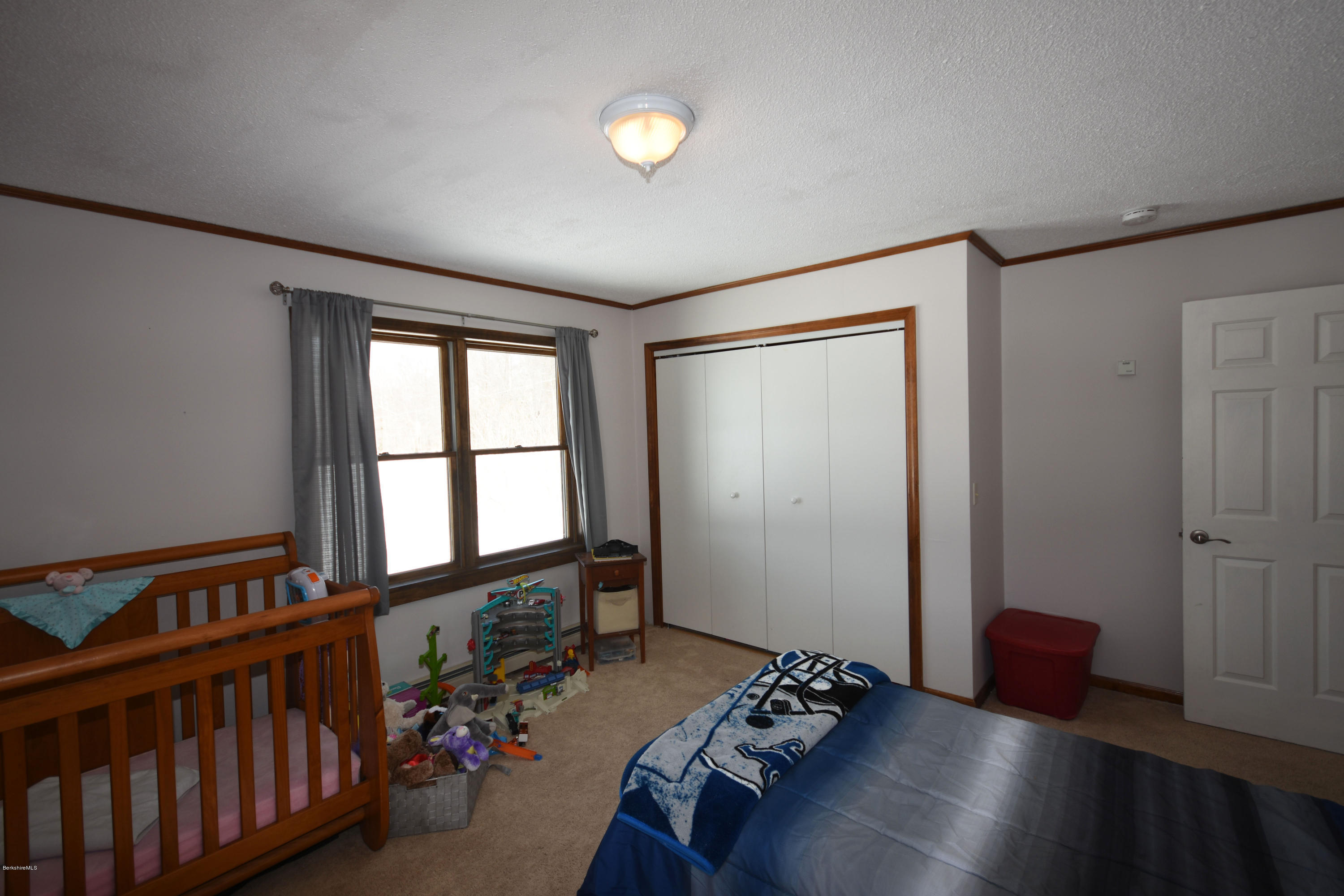 215 Windsor Road Savoy, MA 01256 - Photo 36 of 55 a bedroom with furniture and a window