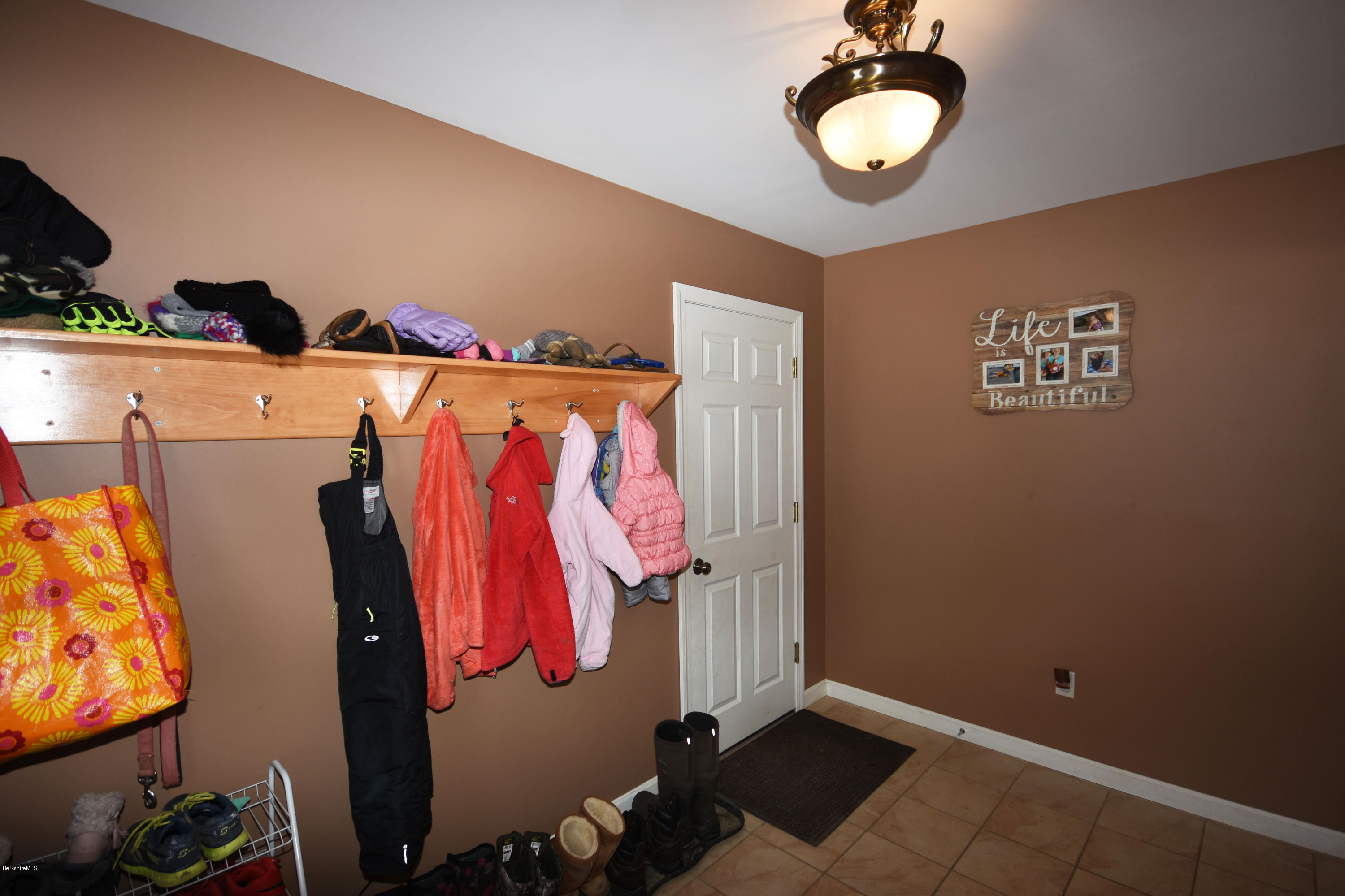 215 Windsor Road Savoy, MA 01256 - Photo 42 of 55 a view of walk in closet with clothes and shoes