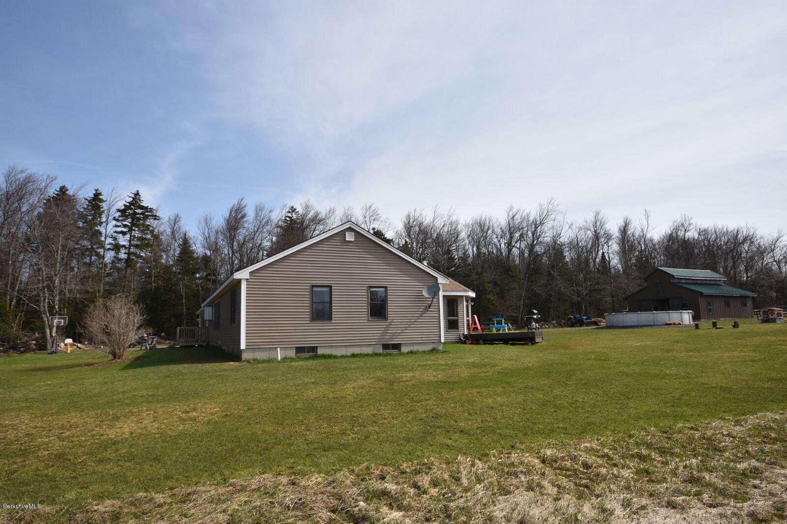 215 Windsor Road Savoy, MA 01256 - Photo 51 of 55 a front view of house with garden
